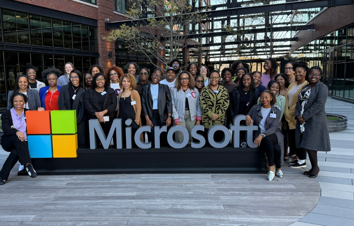 A group of approximately 36 Black women researchers gathered for a group photo at the Black Women in Tech Convening.